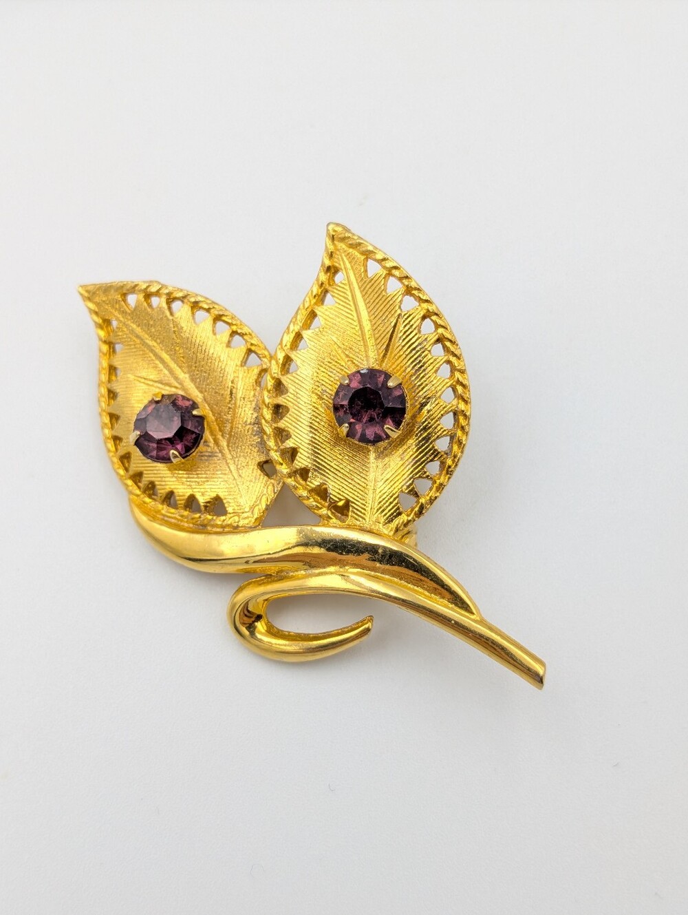 Vintage signed Celebrity purple rhinestone gold tone leaf brooch pin